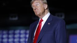 GREENSBORO, NORTH CAROLINA - OCTOBER 22: Republican presidential nominee, former U.S. President Donald Trump watches as Former U.S. Representative from Hawaii Tulsi Gabbard speaks at a campaign rally at the Greensboro Coliseum on October 22, 2024 in Greensboro, North Carolina. With 14 days to go until Election Day, Trump continues to crisscross the country campaigning to return to office. (Photo by Anna Moneymaker/Getty Images)