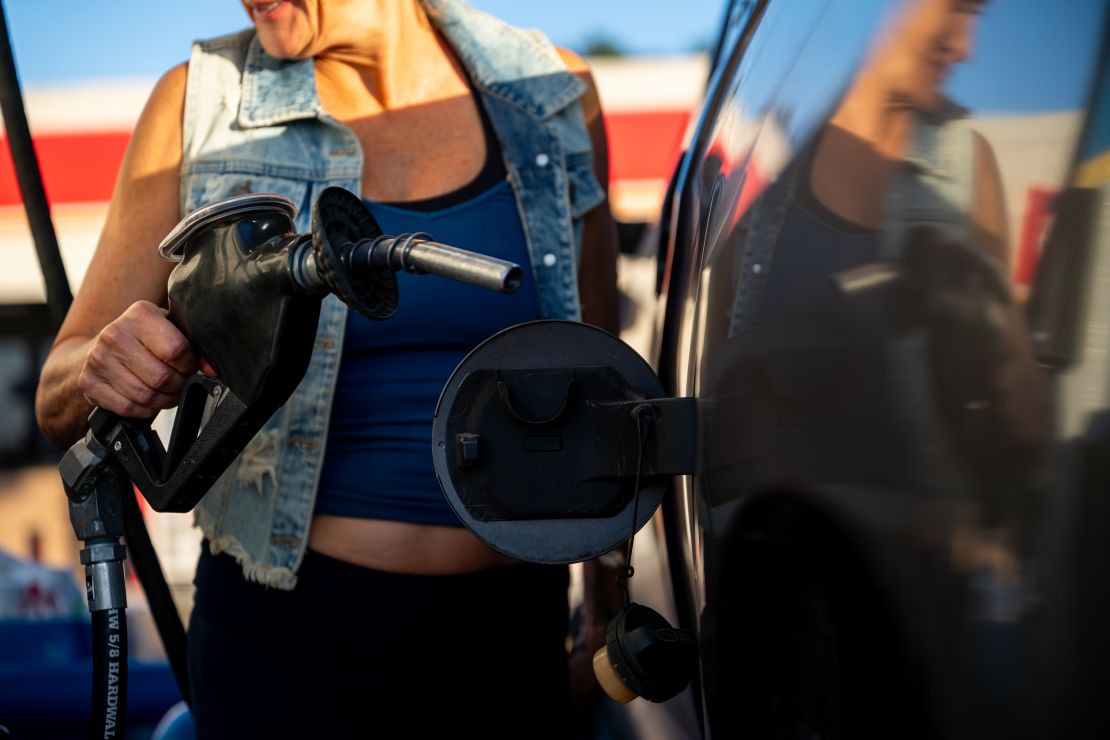 A person finishes pumping gas in Austin, Texas, on October 22, 2024.