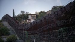 The border wall seprating the US (L) from Mexico in Nogales, Arizona, on October 26, 2024. (Photo by ERNESTO BENAVIDES / AFP) (Photo by ERNESTO BENAVIDES/AFP via Getty Images)