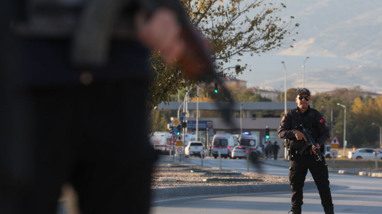 ANKARA, TURKEY - OCTOBER 23: Police stand guard at the road leading to the Turkish Aerospace Industries facility following an attack on October 23, 2024 in Ankara, Turkey. An attack occurred at the Turkish Aerospace Industries facility in Ankara, with preliminary reports suggesting two attackers detonated an explosive device and opened fire at the entrance gate of the facility. (Photo by Serdar Ozsoy/Getty Images)