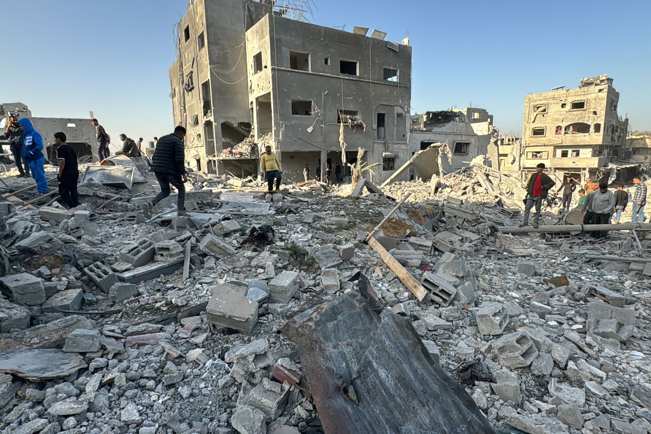 Palestinians inspect the damage after an overnight Israeli airstrike in Beit Lahia, Gaza on October 27.