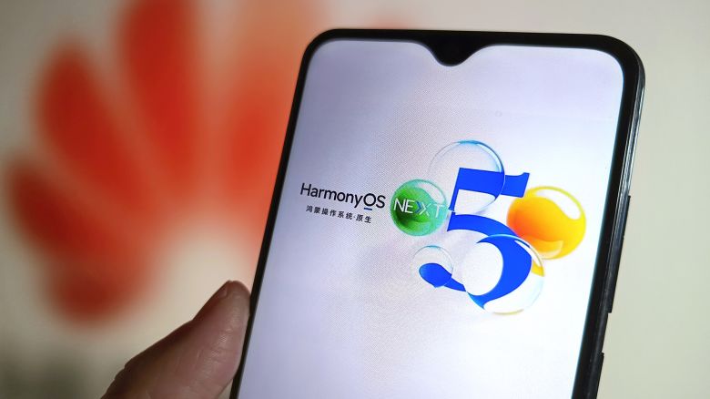 Huawei's HarmonyOS NEXT operating system is displayed on a smartphone screen with a Huawei logo in the background.