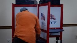 RACINE, WISCONSIN - OCTOBER 24: Residents vote at an in-person early voting location at city hall on October 24, 2024 in Racine, Wisconsin. Early voting numbers have been high across the state since the process began on Tuesday. (Photo by Scott Olson/Getty Images)