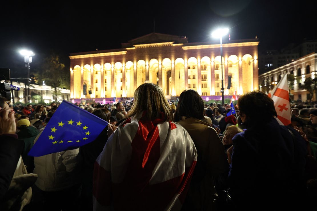 Georgian opposition supporters rally outside the parliament in Tbilisi on Monday.