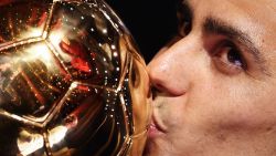 TOPSHOT - Manchester City's Spanish midfielder Rodri kisses the trophy as he receives the Ballon d'Or award during the 2024 Ballon d'Or France Football award ceremony at the Theatre du Chatelet in Paris on October 28, 2024. (Photo by FRANCK FIFE / AFP) (Photo by FRANCK FIFE/AFP via Getty Images)