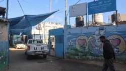 A UN vehicle enters the UNRWA (United Nations Relief and Works Agency) center at the Nuseirat camp for Palestinian refugees in the central Gaza Strip on October 29, 2024. Israel faced a mounting international backlash on October 29, after its parliament approved a bill banning the main UN aid agency for the devastated Gaza Strip. (Photo by Eyad BABA / AFP) (Photo by EYAD BABA/AFP via Getty Images)