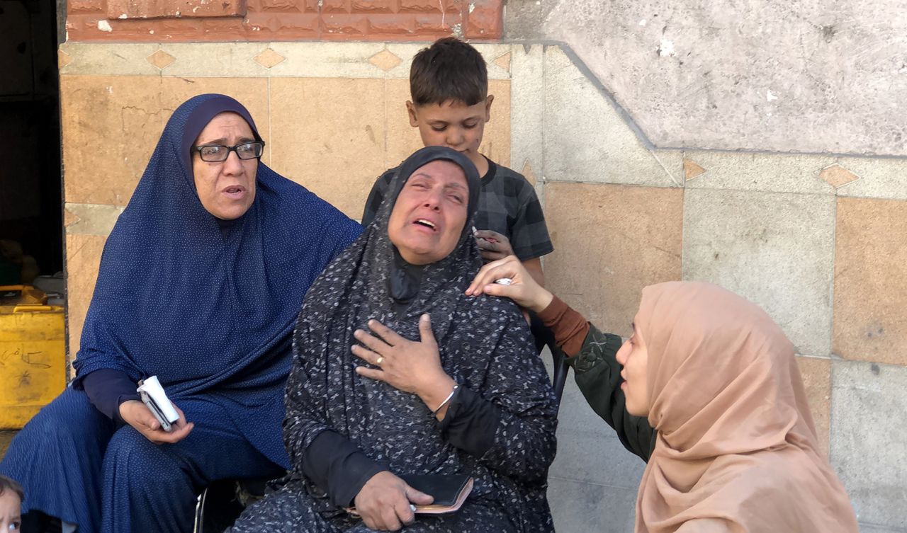 Relatives of Palestinians killed in Israeli attacks mourn in Beit Lahiya, Gaza, on October 29.