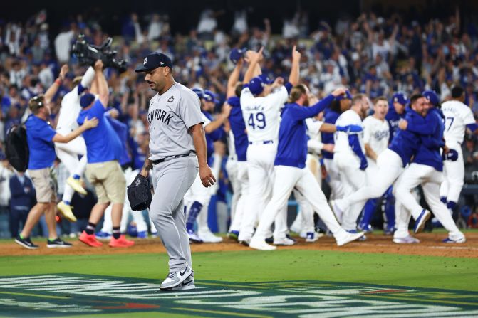 The New York Yankees' Nestor Cortes leaves the field after giving up the walk-off grand slam to Freeman, costing the Yankees Game 1 of the World Series.