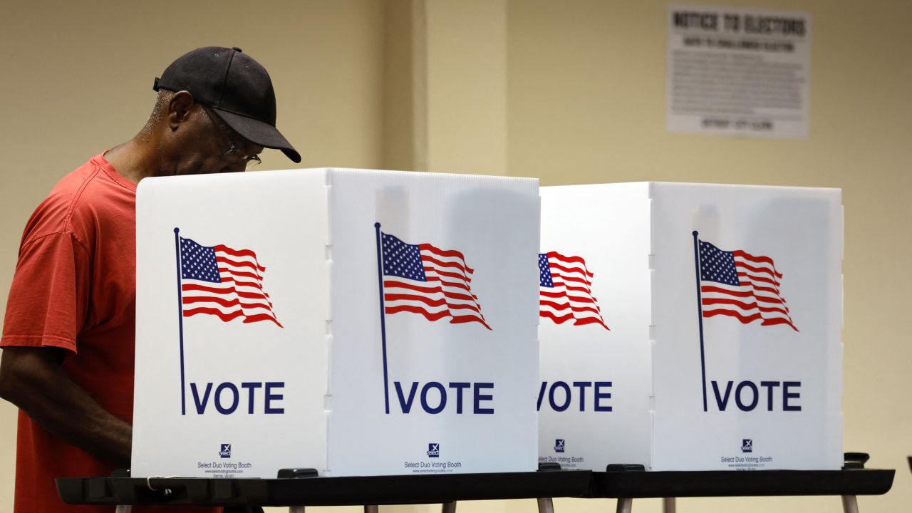 TOPSHOT - People cast their in-person early ballot for the 2024 general election at the Northwest Activities Center on October 29, 2024 in Detroit, Michigan. (Photo by JEFF KOWALSKY / AFP) (Photo by JEFF KOWALSKY/AFP via Getty Images)