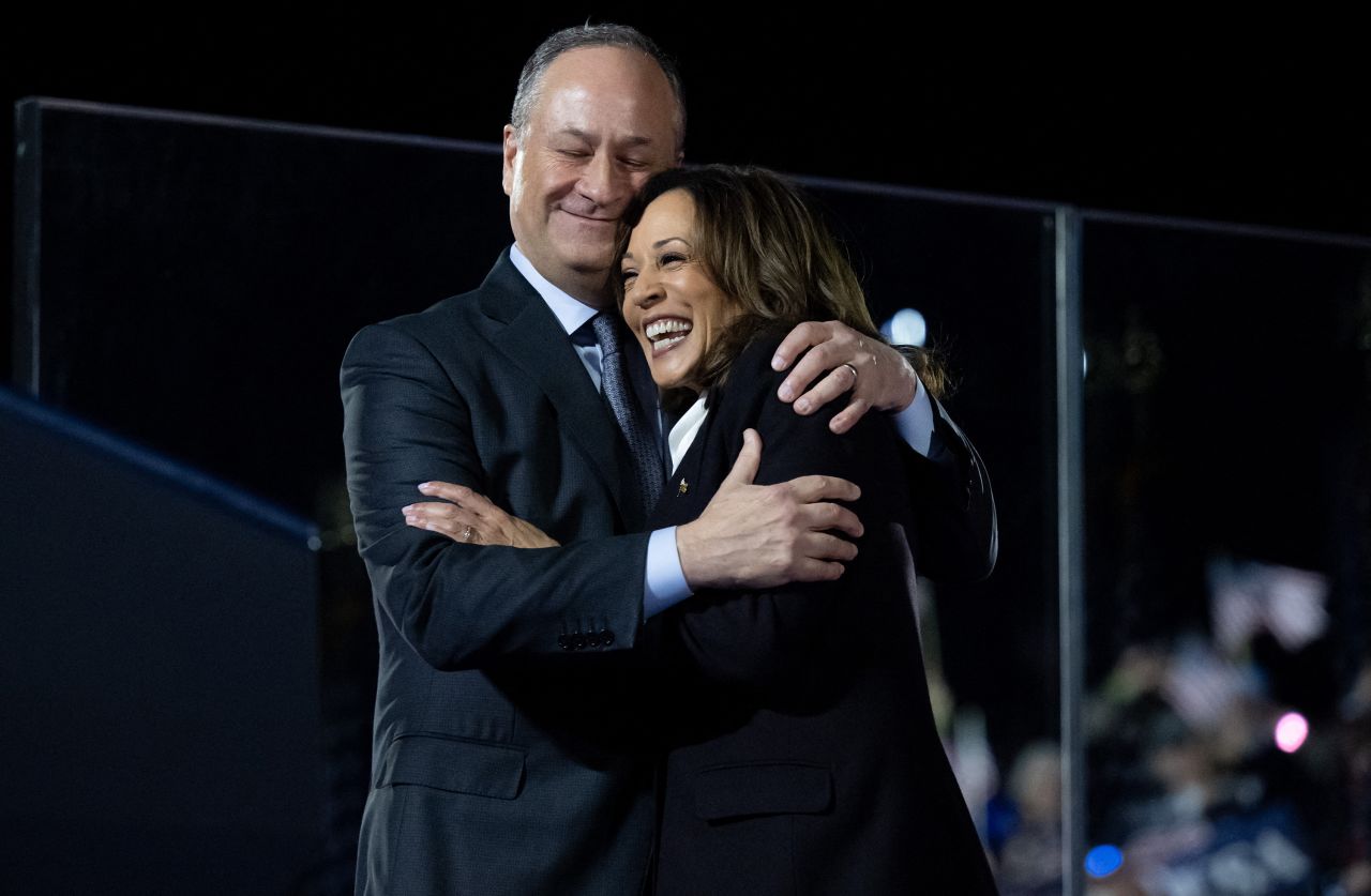 Kamala Harris is hugged by her husband, Doug Emhoff after her speech.