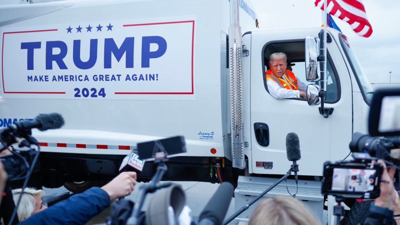 GREEN BAY, WISCONSIN - OCTOBER 30: (EDITOR'S NOTE: Alternate crop) Republican presidential nominee, former President Donald Trump holds a press conference from inside trash hauler at Green Bay Austin Straubel International Airport on October 30, 2024 in Green Bay, Wisconsin. With less than a week until Election Day, Trump is campaigning for re-election in the battleground states of North Carolina and Wisconsin. (Photo by Chip Somodevilla/Getty Images)