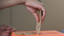 MONTEVIDEO, URUGUAY - OCTOBER 27: A man casts his vote during the presidential election on October 27, 2024 in Montevideo, Uruguay. Yamandu Orsi, the center-left opposition leader from the Frente Amplio (Broad Front) party is the main challenger to the governing party’s candidate, Álvaro Delgado. (Photo by Guillermo Legaria/Getty Images)