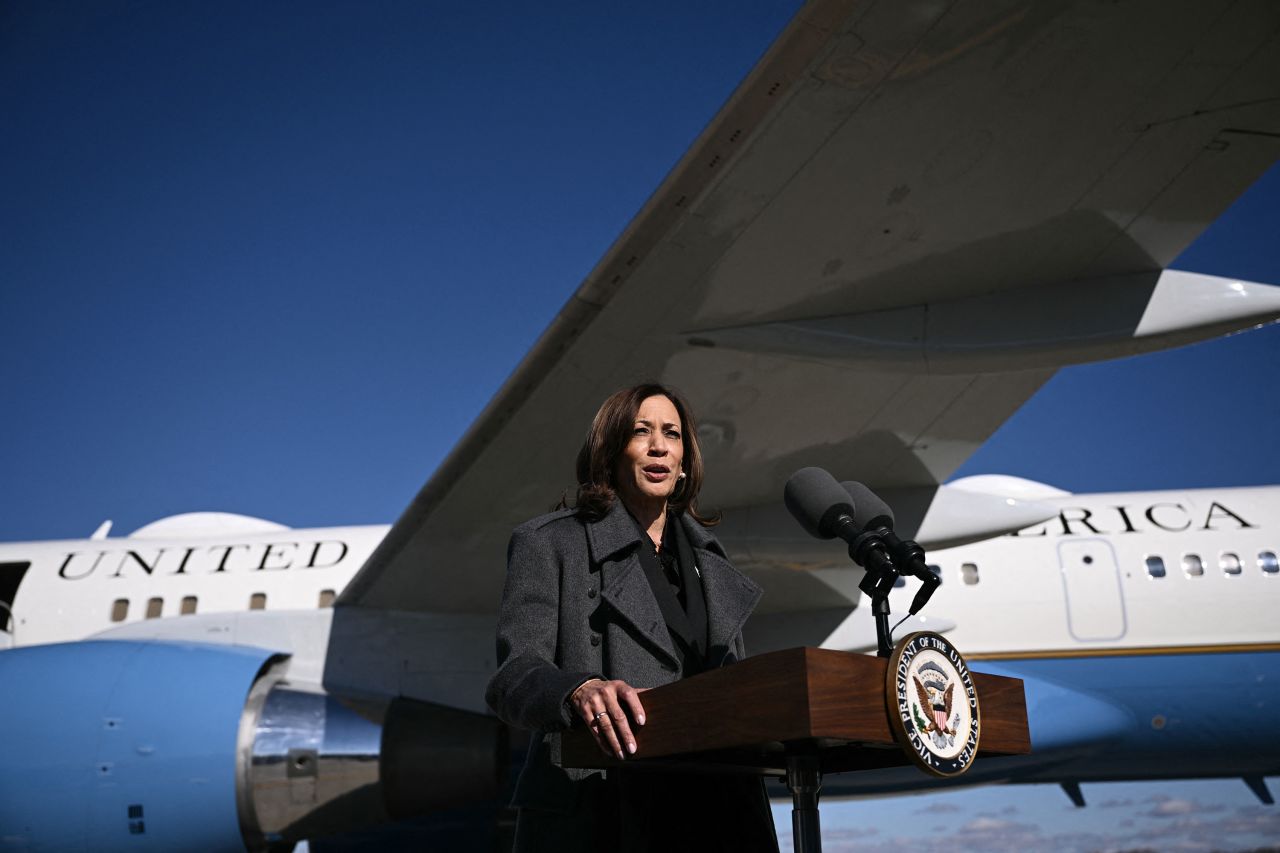 Vice President Kamala Harris speak to the press after arriving at Dane County Regional Airport in Madison, Wisconsin, on November 1.