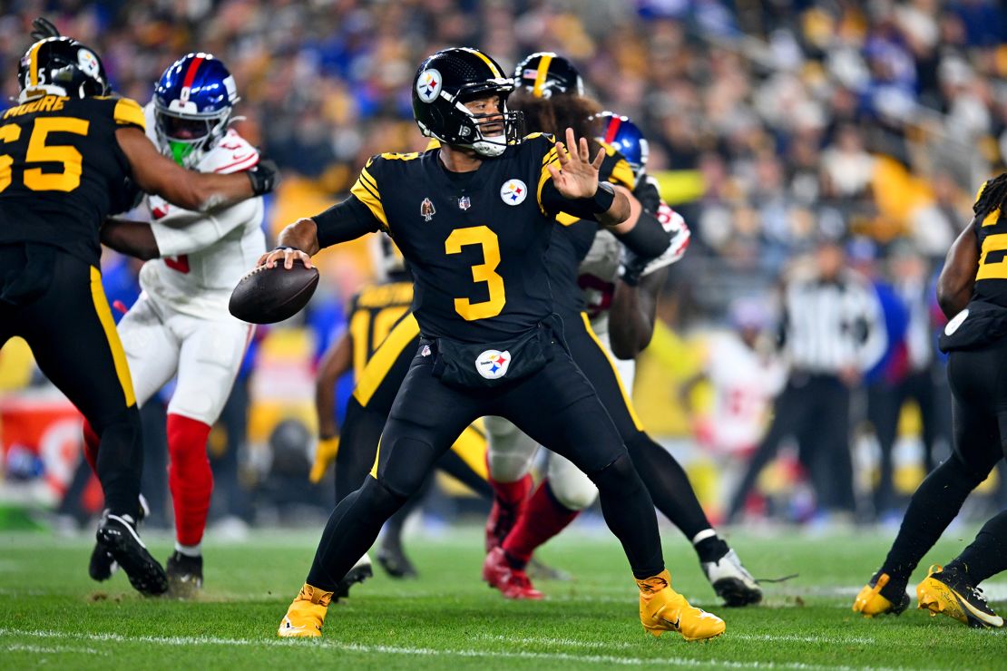 Wilson attempts a pass against the New York Giants.