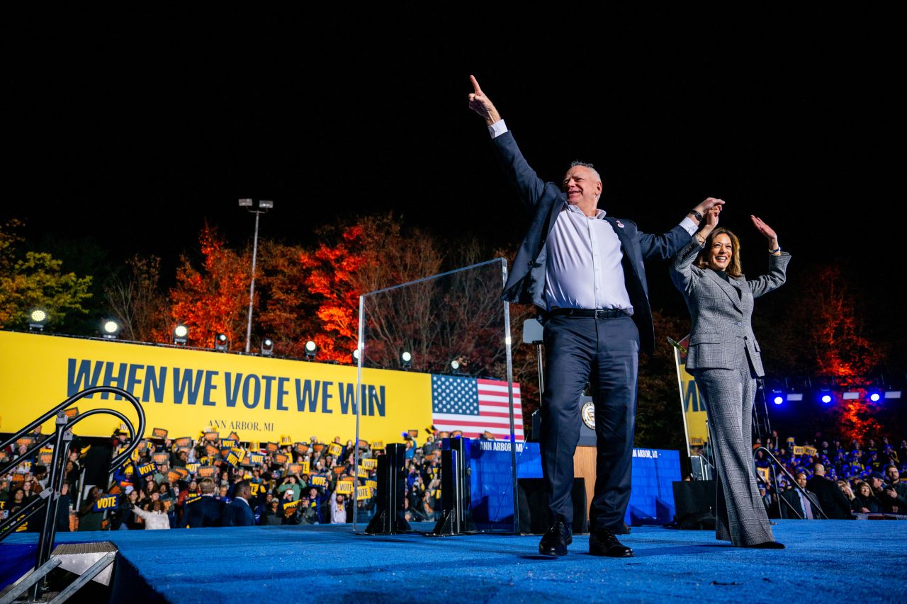 Democratic presidential nominee, Vice President Kamala Harris and running mate Democratic vice presidential nominee, Minnesota Gov. Tim Walz, greet supporters at a campaign rally in Ann Arbor, Michigan, on October 28.