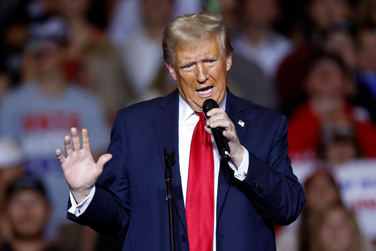 Republican presidential candidate, former President Donald Trump gestures as he speaks at a campaign rally at the Fiserv Forum in Milwaukee, Wisconsin, on November 1, 2024.