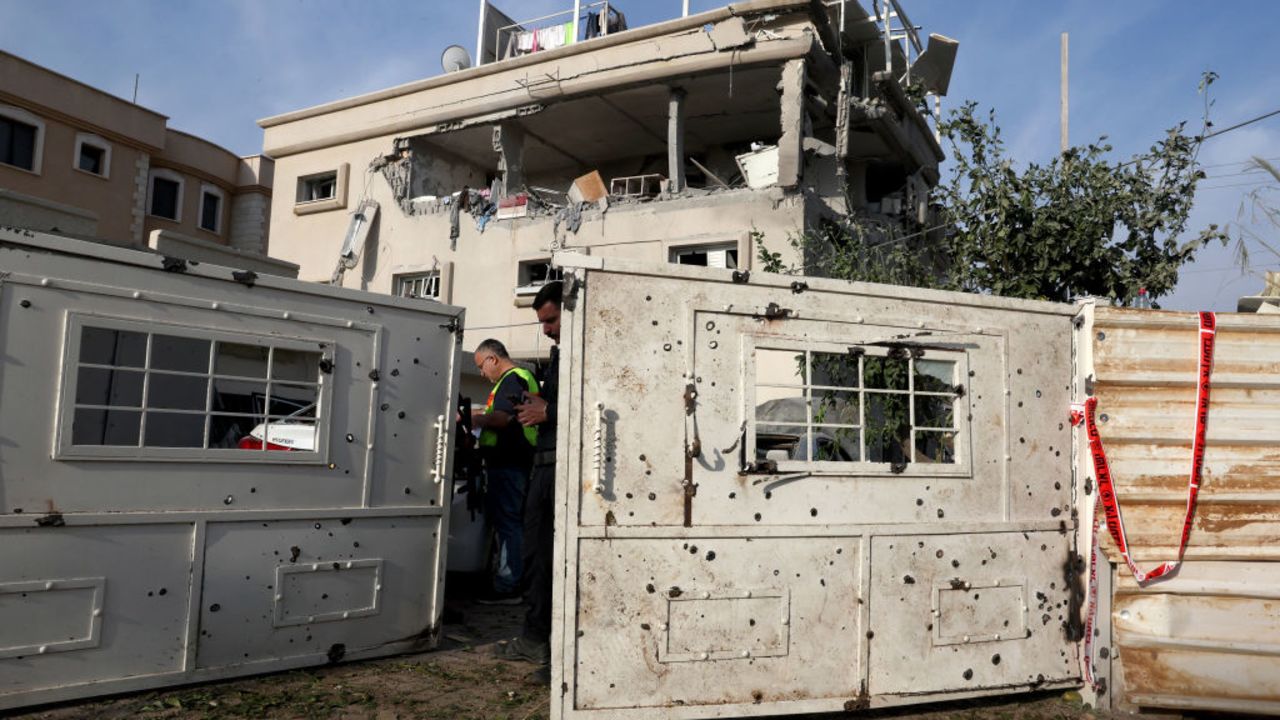 Israeli police officers check the damage following a rocket attack from southern Lebanon that targeted the central Israeli-Arab city of Tira, on November 2, 2024, amid the ongoing war between Israel and Hezbollah. (Photo by JACK GUEZ / AFP) (Photo by JACK GUEZ/AFP via Getty Images)