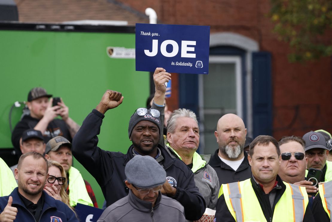 Workers cheer as Biden arrives to speak at the Carpenters Local Union 445 "Get Out the Vote" event in Scranton on November 2, 2024.