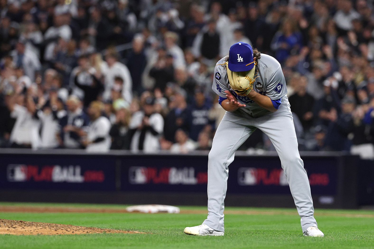 Dodgers pitcher Brent Honeywell screams into his glove after giving up a three-run homer to Gleyber Torres in the eighth inning Tuesday.