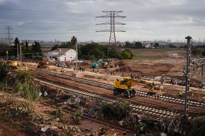 Heavy machinery is used to carry out repairs on the flood-damaged railway tracks in Sedavi on Sunday.