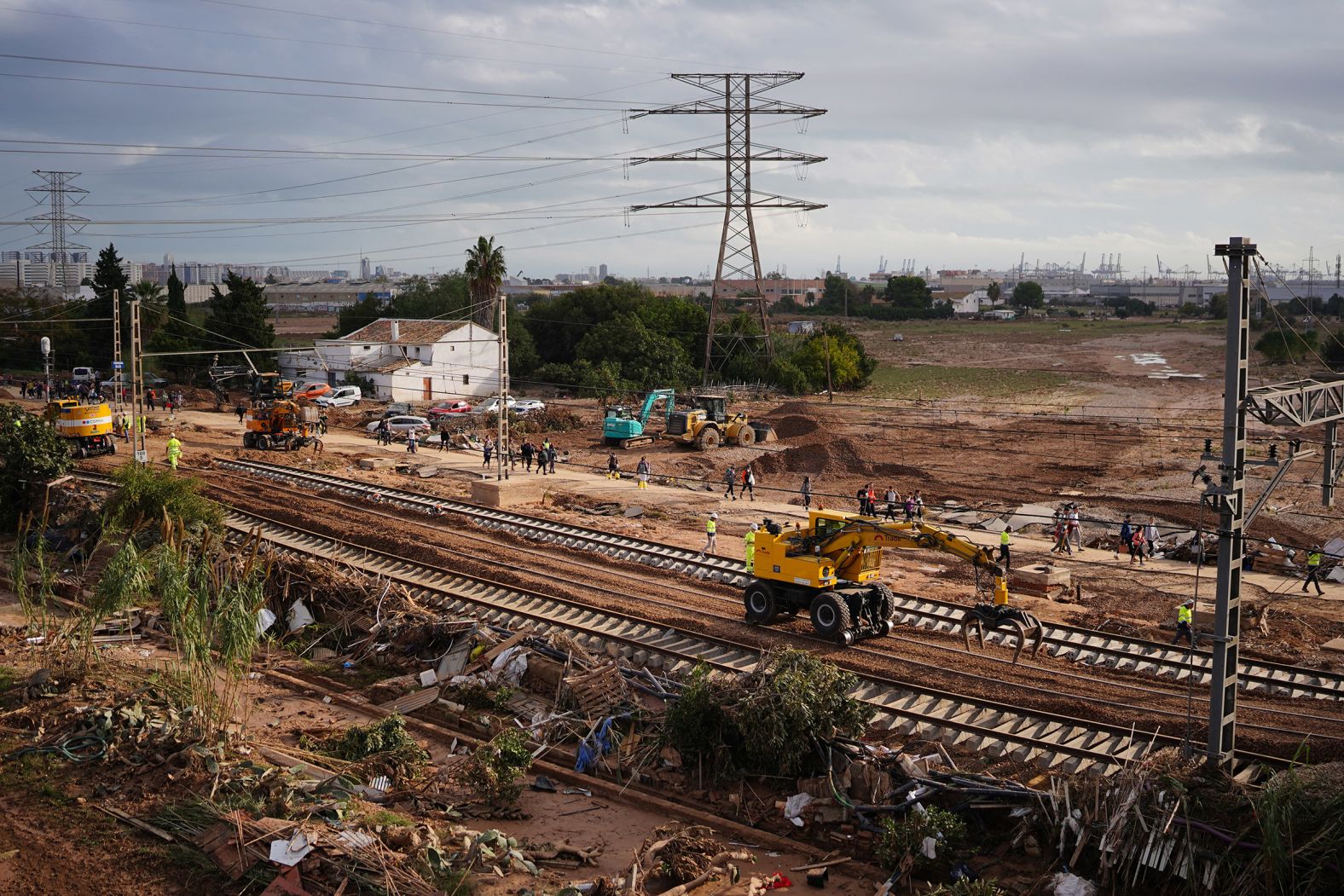 Heavy machinery is used to carry out repairs on the flood-damaged railway tracks in Sedavi on Sunday.