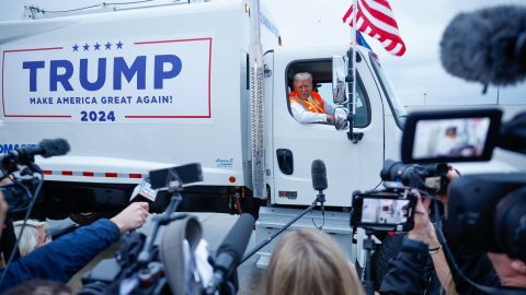 Former President Donald Trump holds a news conference from inside trash hauler at the airport in Green Bay, Wisconsin, on October 30, 2024.