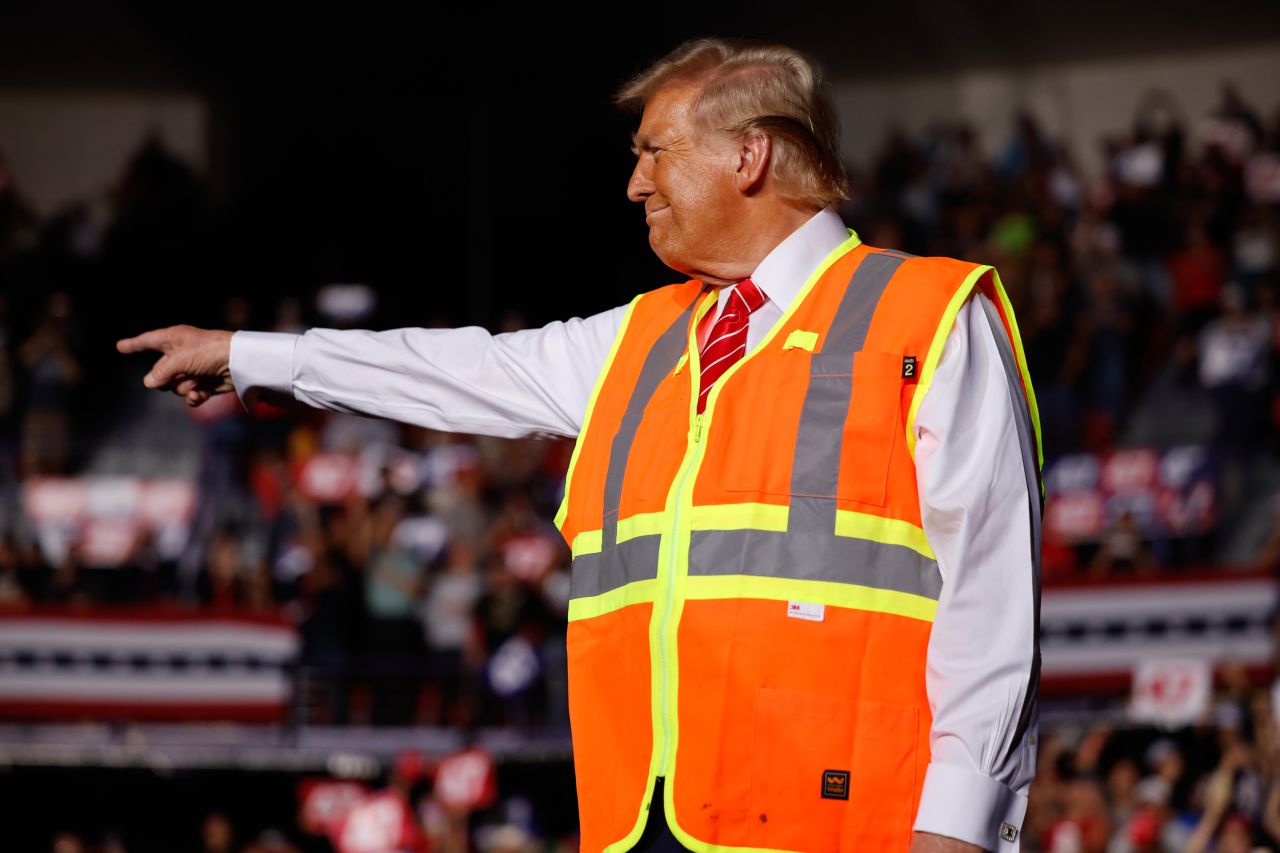 Republican presidential nominee, former President Donald Trump greets supporters during a campaign rally in Green Bay, Wisconsin, on October 30.