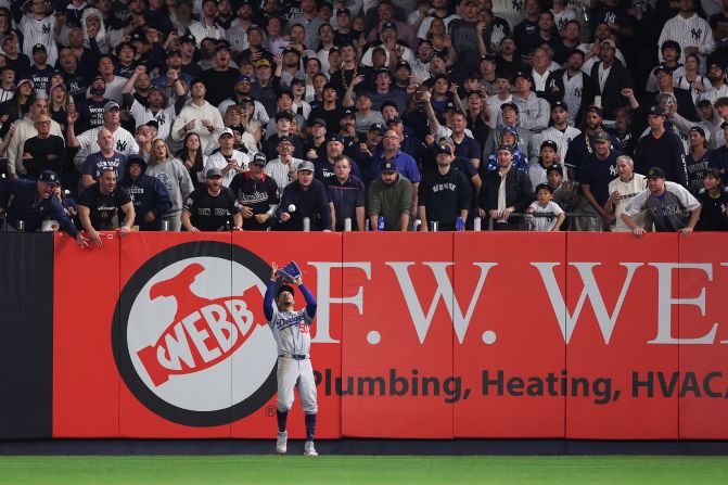 Dodgers outfielder Mookie Betts catches a fly ball to end the fifth inning Wednesday.