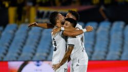 MONTEVIDEO, URUGUAY - OCTOBER 30: Thiago Almada of Botafogo celebrates with teammates after scoring the team's first goal during the Copa CONMEBOL Libertadores 2024 Semifinal second leg match between Peñarol and Botafogo at Centenario Stadium on October 30, 2024 in Montevideo, Uruguay. (Photo by Ernesto Ryan/Getty Images)