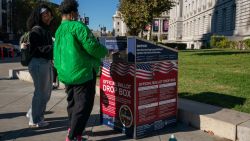 SAN FRANCISCO, CALIFORNIA - NOVEMBER 4: Voters drop off ballots at an official ballot drop box on the final day of early voting ahead of Election Day at City Hall on November 4, 2024 in San Francisco, California. Millions of Americans will cast their ballots tomorrow in the presidential race between Republican nominee former President Donald Trump and Democratic nominee Vice President Kamala Harris, as well as multiple state elections that will determine the balance of power in Congress. (Photo by Loren Elliott/Getty Images)