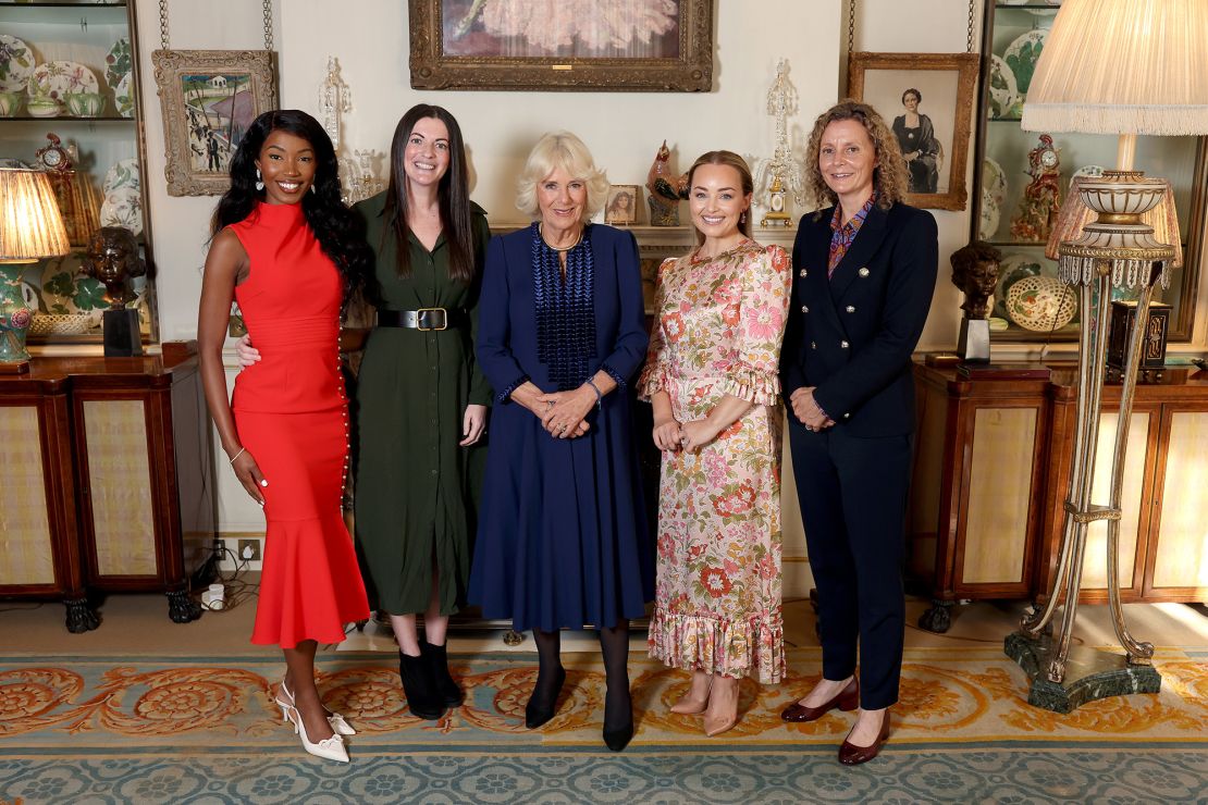 Queen Camilla, center, poses with (L-R) Rehema Muthamia, Emma Armstrong, Alice Liveing and Sharon Baker ahead of a special reception held on October 30 for the exclusive screening of the new documentary.