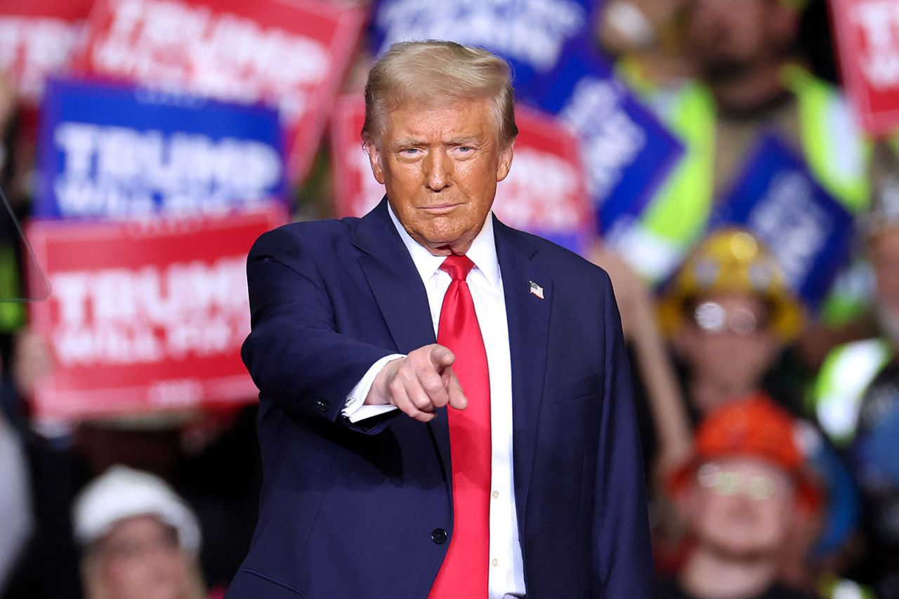 Former President Donald Trump gestures during a campaign rally in Pittsburgh, Pennsylvania on Monday, November 4.