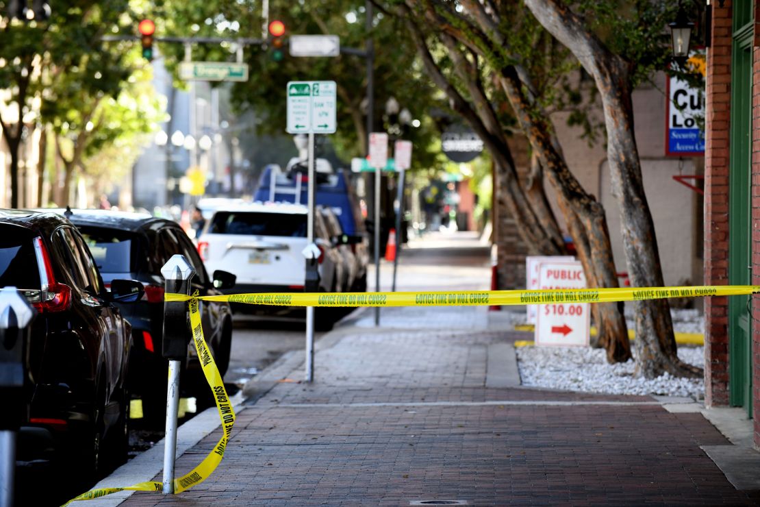 General view of the crime scene tape on Central Boulevard. and Orange Avenue, where a shooting occurred during a Halloween party on November 1, 2024 in Orlando, Florida.