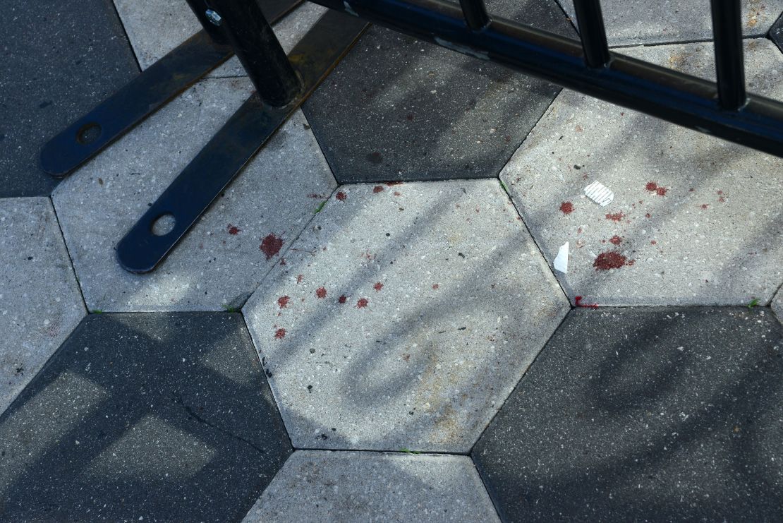 Blood stains were seen on the sidewalk along Orange Ave. where a shooting occurred during Halloween celebrations on November 1, 2024 in Orlando, Florida.