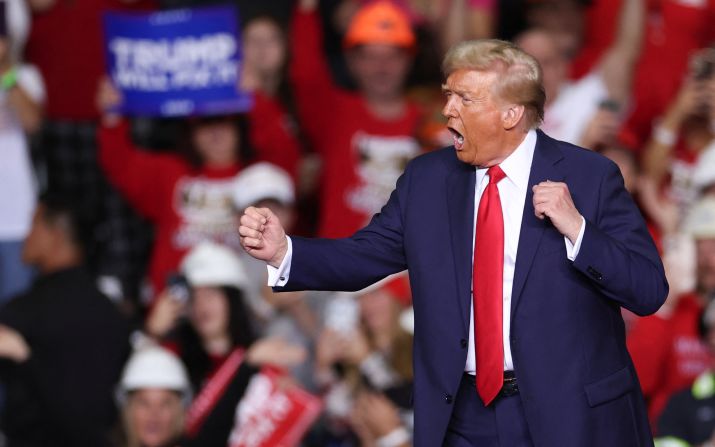 Trump dances on stage after speaking at a campaign rally in Pittsburgh on November 4.