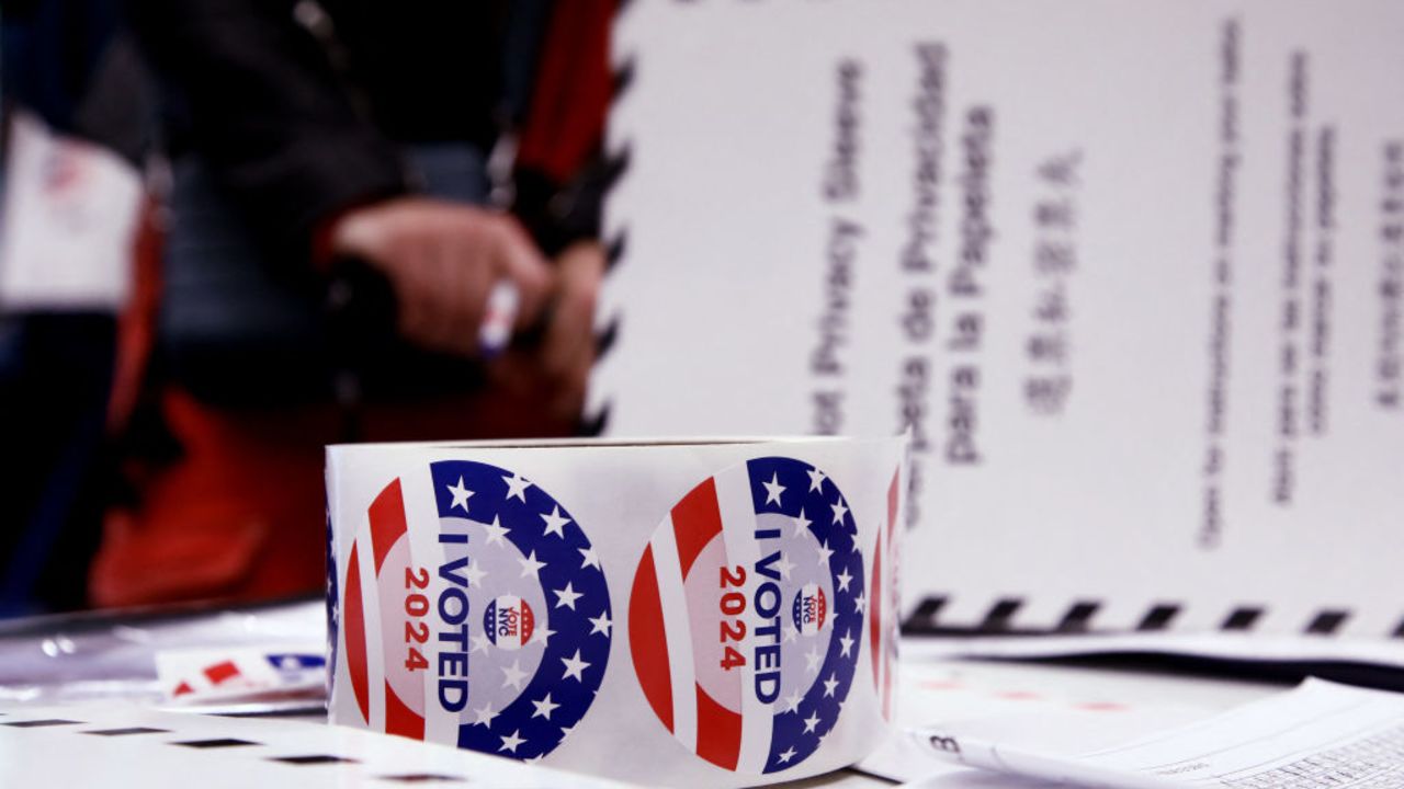 A roll of "I Voted" stickers sit on a table at a polling station in New York City on Election Day, November 5, 2024. (Photo by Leonardo Munoz / AFP) (Photo by LEONARDO MUNOZ/AFP via Getty Images)