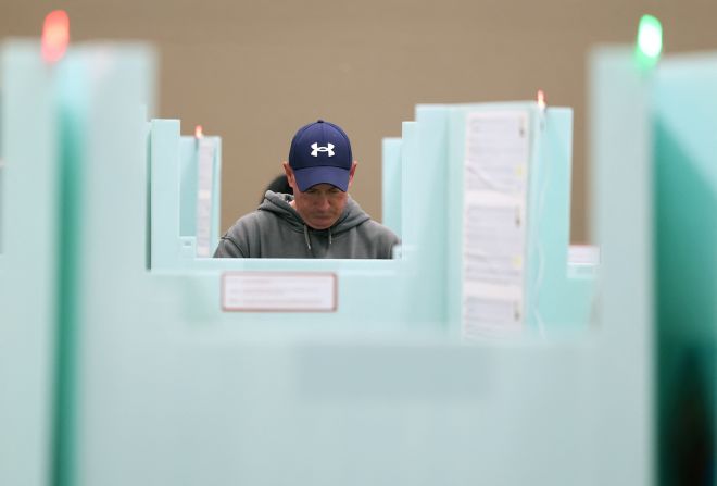 A voter fills out a ballot at a polling station in Las Vegas on Tuesday.