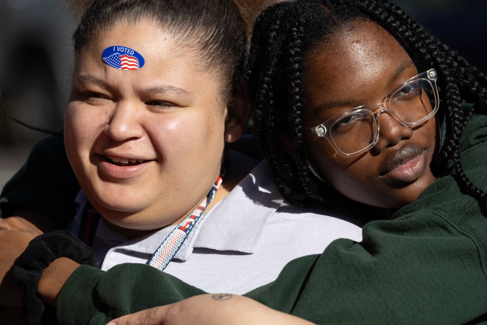 Two voters pose after casting their ballots in Pittsburgh on Tuesday.