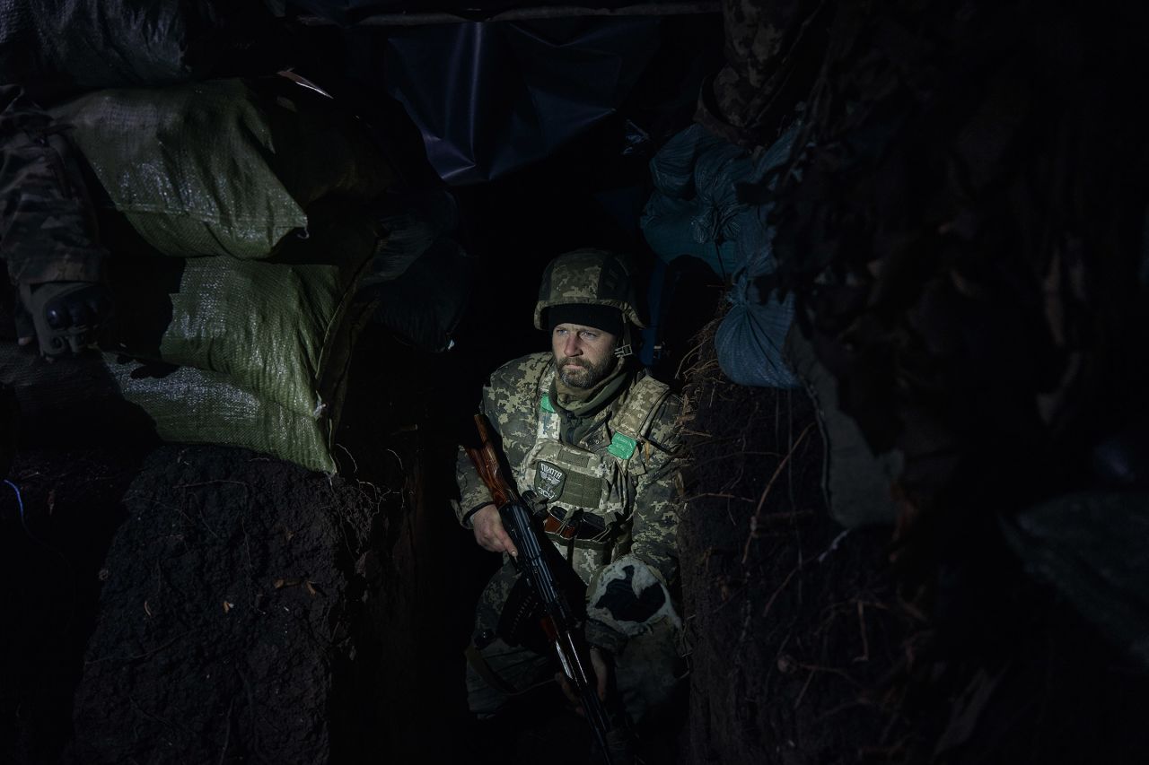 A Ukrainian soldier in a trench 100 meters from Russian positions in the Serebryansky forest of Ukraine on November 6, 2024.