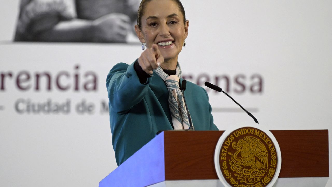 Mexico's President Claudia Sheinbaum points to a reporter for the next question during her daily press conference at the National Palace in Mexico City on November 6, 2024. Mexican President Claudia Sheinbaum said Wednesday that Donald Trump's election victory was "no cause for concern" for her country, despite his threats of tariffs and mass migrant deportations. (Photo by ALFREDO ESTRELLA / AFP) (Photo by ALFREDO ESTRELLA/AFP via Getty Images)