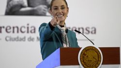 Mexico's President Claudia Sheinbaum points to a reporter for the next question during her daily press conference at the National Palace in Mexico City on November 6, 2024. Mexican President Claudia Sheinbaum said Wednesday that Donald Trump's election victory was "no cause for concern" for her country, despite his threats of tariffs and mass migrant deportations. (Photo by ALFREDO ESTRELLA / AFP) (Photo by ALFREDO ESTRELLA/AFP via Getty Images)