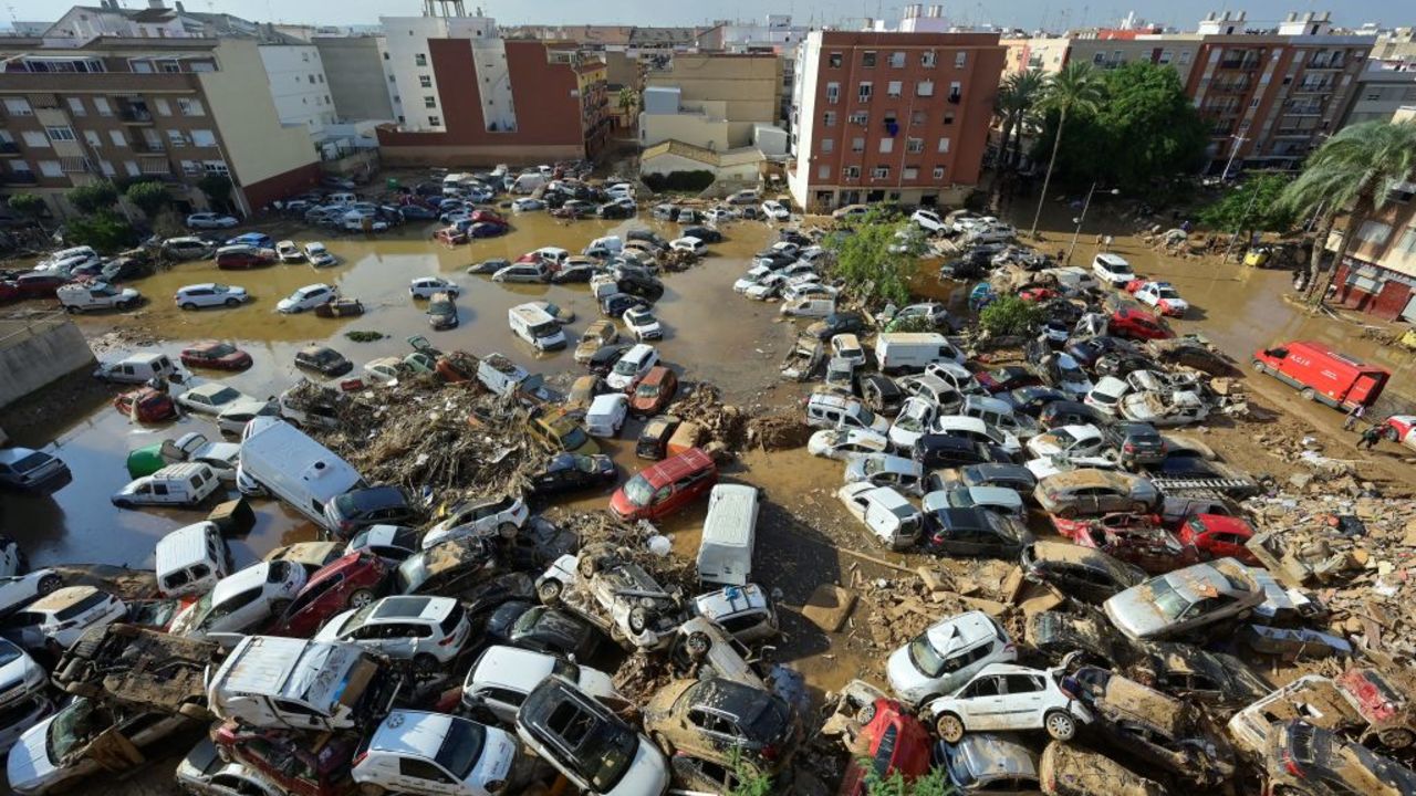 Piled up cars are pictured in Paiporta, south of Valencia, eastern Spain, on November 6, 2024, in the aftermath of deadly floods. Spain announced an aid package worth 10.6 billion euros ($11.5 billion) to rebuild regions devastated by its worst floods in a generation that have killed 219 people. (Photo by JOSE JORDAN / AFP) (Photo by JOSE JORDAN/AFP via Getty Images)