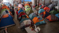 Migrants and asylum seekers are seen at Juventud 2000 shelter in Tijuana, Baja California state, Mexico, on November 6, 2024, on the aftermath of the US presidential election. Mexican President Claudia Sheinbaum said Wednesday that Donald Trump's election victory was "no cause for concern" for her country, despite his threats of tariffs and mass migrant deportations. (Photo by Guillermo Arias / AFP) (Photo by GUILLERMO ARIAS/AFP via Getty Images)