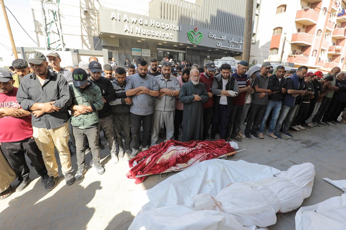 Mourners perform Janazah, the Islamic funeral prayer, in Al-Awda Hospital, after an Israeli attack on the house of the Yazici family, in central Gaza, on Thursday.