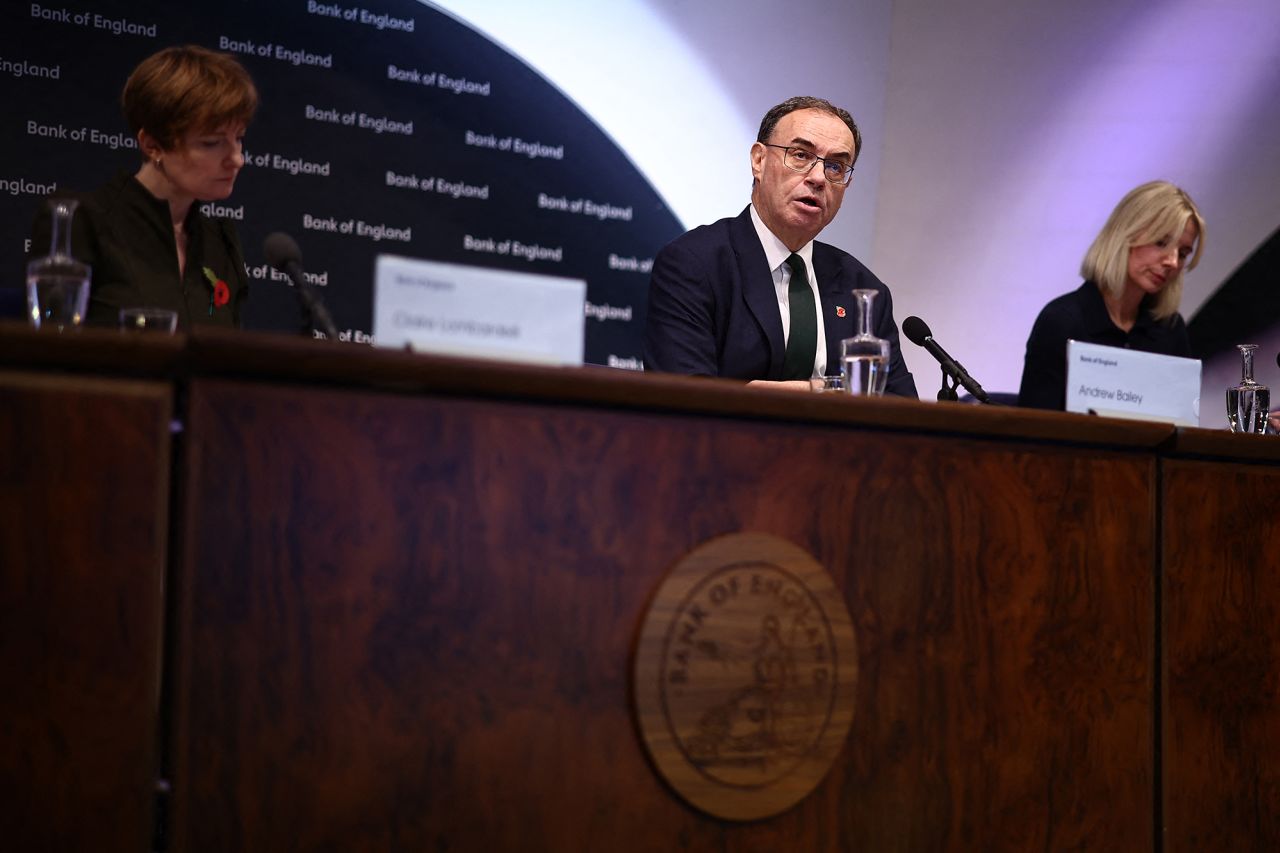 Bank of England Governor Andrew Bailey (C) speaks during the central bank's Monetary Policy Report press conference at the Bank of England, in London, on November 7.