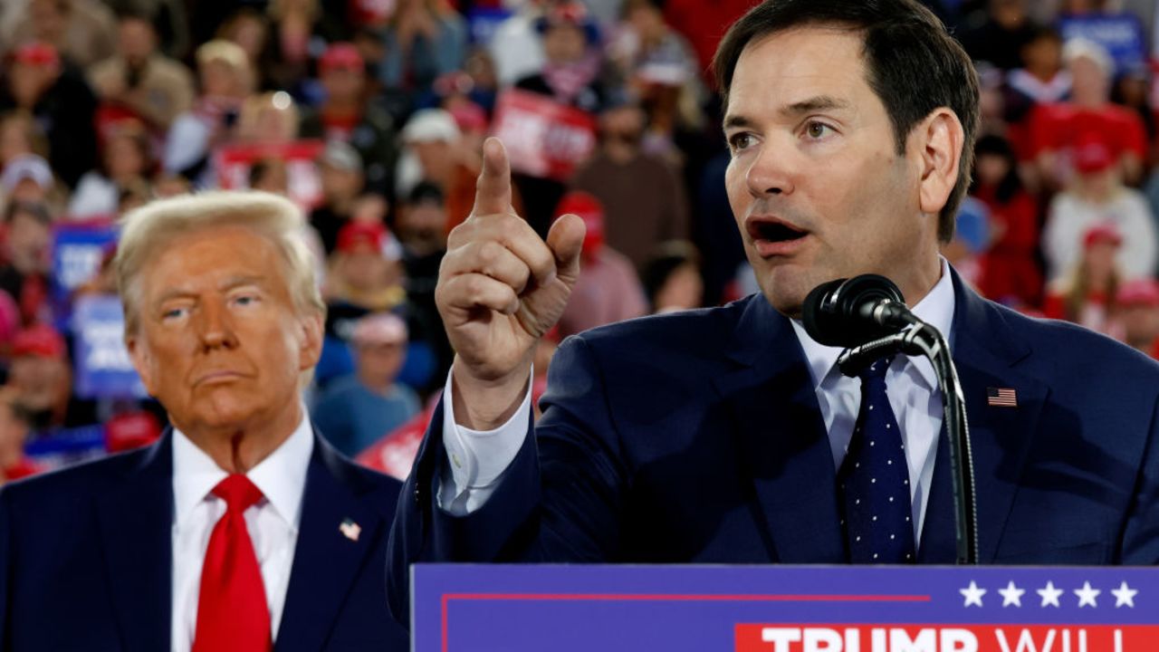 RALEIGH, NORTH CAROLINA - NOVEMBER 04:  Republican presidential nominee, former U.S. President Donald Trump watches as U.S. Sen. Marco Rubio (R-FL) speaks during a campaign rally at the J.S. Dorton Arena on November 04, 2024 in Raleigh, North Carolina. With one day left before the general election, Trump is campaigning for re-election in the battleground states of North Carolina, Pennsylvania and Michigan.  (Photo by Chip Somodevilla/Getty Images)