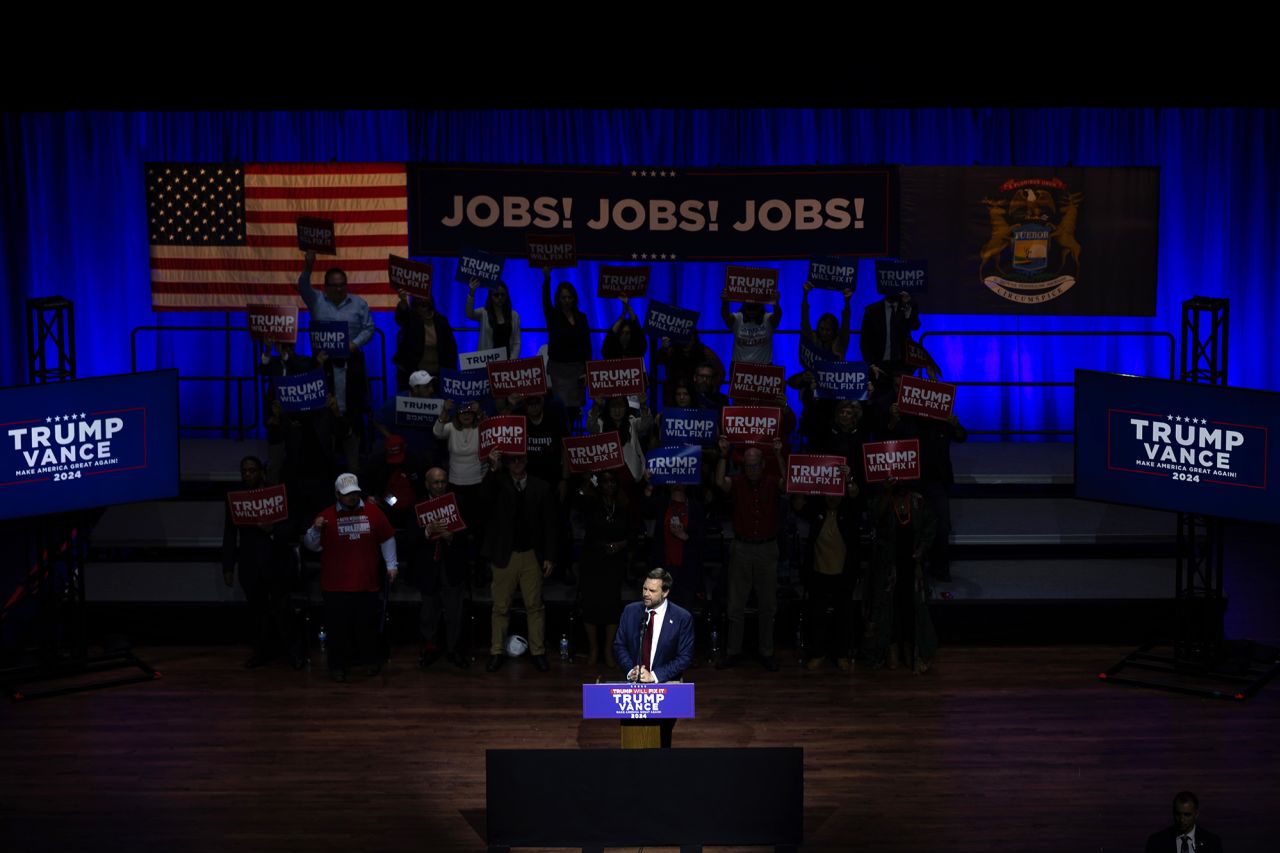 Sen. J.D. Vance speaks to supporters during a rally in Flint, Michigan, on Monday.