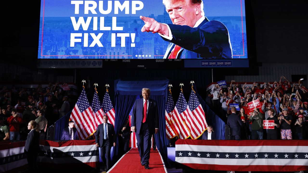 GRAND RAPIDS, MICHIGAN - NOVEMBER 05: Republican presidential nominee, former U.S. President Donald Trump, takes the stage for his last rally of the election year at Van Andel Arena on November 05, 2024 in Grand Rapids, Michigan. Trump campaigned for re-election in the battleground states of North Carolina and Pennsylvania before arriving for his last rally minutes after midnight in Michigan. (Photo by Chip Somodevilla/Getty Images)