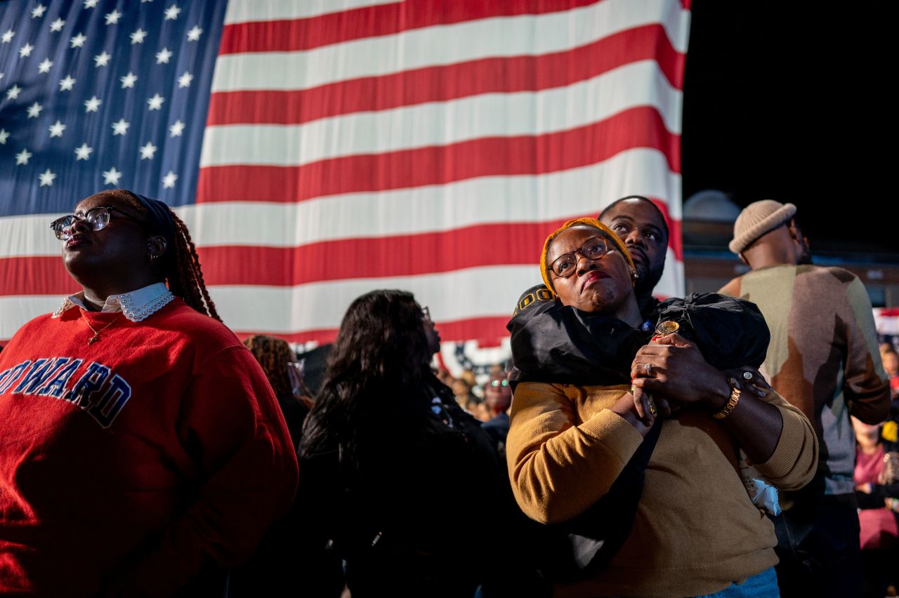 Kamala Harris supporters embrace as they watch poll results at the Harris-Walz watch party at Howard University in Washington, DC, on Tuesday.