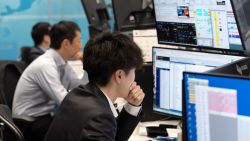 TOKYO, JAPAN - NOVEMBER 06: Dealers work at a foreign exchange brokerage on November 06, 2024 in Tokyo, Japan. People tuned in to watch the pivotal 2024 U.S. presidential election at venues and in homes across Asia, with the result having direct consequences for trade, security and geopolitics in the region. (Photo by Tomohiro Ohsumi/Getty Images)